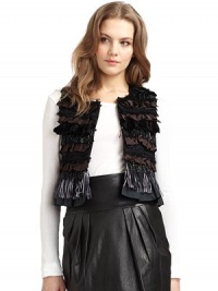 THE LOOKSleevelessFront hook-and-eye closureAllover textured ribbon, beaded and fringed embellishmentRibbed backTHE FITAbout 17 longTHE MATERIAL58% cotton/42% rayonFully linedCARE & ORIGINDry cleanMade in ItalyModel shown is 5'9&12; (176cm) wearing US size 4. THE LOOKSleevelessFront hook-and-eye closureAllover textured ribbon, beaded and fringed embellishmentRibbed backTHE FITAbout 17 longTHE MATERIAL58% cotton/42% rayonFully linedCARE & ORIGINDry cleanMade in ItalyModel shown is 5'9&12; (176cm) wearing US size 4.
