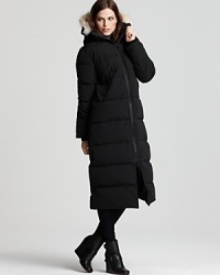 Canada Goose's full calf-length parka provides ultra protection and warmth. The hood boasts a removable coyote fur ruff and Velcro® collar for versatility. Canada Goose's full calf-length parka provides ultra protection and warmth. The hood boasts a removable coyote fur ruff and Velcro® collar for versatility.