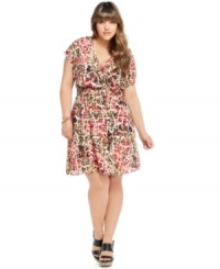 Spotlight fierce style this season with American Rag's short sleeve plus size dress, featuring a bold animal print. Spotlight fierce style this season with American Rag's short sleeve plus size dress, featuring a bold animal print.