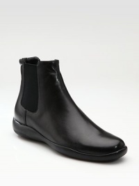 A classic shape of supple Nappa leather featuring elasticized gores on either side.Leather lining Padded insole Rubber sole Imported A classic shape of supple Nappa leather featuring elasticized gores on either side.Leather lining Padded insole Rubber sole Imported