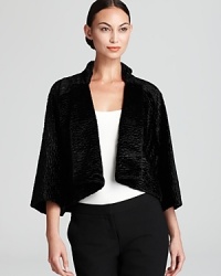 Geometric tailoring and clean lines craft a striking T Tahari jacket, accentuated with allover faux fur for real exotic edge. Geometric tailoring and clean lines craft a striking T Tahari jacket, accentuated with allover faux fur for real exotic edge.