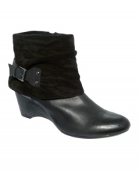 Clarks' Artisan Trolly Twirl booties will set off your look with it's terrific cuff and back buckle wrap. Clarks' Artisan Trolly Twirl booties will set off your look with it's terrific cuff and back buckle wrap.