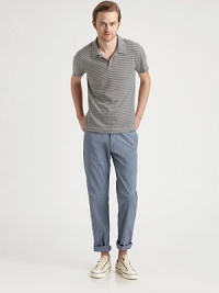 A stretch cotton blend creates a pair of relaxed-straight pants tailored in a smooth, streamlined silhouette that fits close to the leg and adds instant polish to your casual, everyday ensemble.Flat-front styleZip flySide slash, back pocketsInseam, about 3397% cotton/3% spandexDry cleanImported