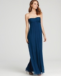 Master streamlined elegance in this Amsale strapless gown, flaunting a famously flattering empire waist.