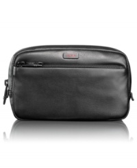 Slim and sleek, this leather travel kit from Tumi offers a convenient, compact design for carrying just the essentials. Slim and sleek, this leather travel kit from Tumi offers a convenient, compact design for carrying just the essentials.