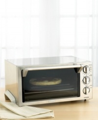 Crafted in stainless steel for a sleek, modern look, this large toaster oven features multiple cooking functions that allow you to bake, broil, toast, slow cook and keep meals warm right on your countertop. One-year manufacturer's warranty. Model EO1260. Crafted in stainless steel for a sleek, modern look, this large toaster oven features multiple cooking functions that allow you to bake, broil, toast, slow cook and keep meals warm right on your countertop. One-year manufacturer's warranty. Model EO1260.