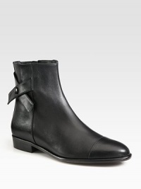 Criss-cross straps top this urban-cool ankle boot of rich leather, with detailed seaming and an easy side zip. Stacked heel, 1 (25mm)Leather upperSnap closure and side zipLeather lining and solePadded insoleImported Criss-cross straps top this urban-cool ankle boot of rich leather, with detailed seaming and an easy side zip. Stacked heel, 1 (25mm)Leather upperSnap closure and side zipLeather lining and solePadded insoleImported