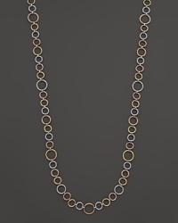 A tri-tone necklace in 18K white gold constructed of nautical cables, accented with diamonds. From Charriol.