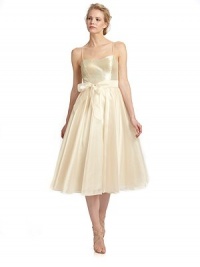 Tonal sequins shine on the bodice of this exceptionally chic tea length style with a delicate sash cinching the waist.Spaghetti straps Tonal sequined bodice Interior bra cups Tie-sash waist Back zipper Pleated organza skirt Fully lined About 47 from shoulder to hem Polyester Spot clean Imported Tonal sequins shine on the bodice of this exceptionally chic tea length style with a delicate sash cinching the waist.Spaghetti straps Tonal sequined bodice Interior bra cups Tie-sash waist Back zipper Pleated organza skirt Fully lined About 47 from shoulder to hem Polyester Spot clean Imported
