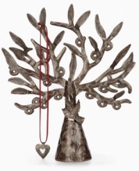 Rooted in tradition. Designed by Charles Brutus, this standing jewelry tree is hand cut from recycled steel and hammered by the artist. Open cutwork in its boughs allow you to hang and display earrings, necklaces and the rest of your jewelry on top of a dresser or table. Rooted in tradition. Designed by Charles Brutus, this standing jewelry tree is hand cut from recycled steel and hammered by the artist. Open cutwork in its boughs allow you to hang and display earrings, necklaces and the rest of your jewelry on top of a dresser or table.