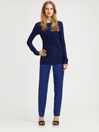 With figure-complementing asymmetrical draping, this fitted jewelneck has long dolman sleeves and a length that hits below the hips. JewelneckLong dolman sleevesLonger length hits below the hips56% rayon/35% polyester/9% spandexHand washImportedModel shown is 5'9 (175cm) wearing US size Small. With figure-complementing asymmetrical draping, this fitted jewelneck has long dolman sleeves and a length that hits below the hips. JewelneckLong dolman sleevesLonger length hits below the hips56% rayon/35% polyester/9% spandexHand washImportedModel shown is 5'9 (175cm) wearing US size Small.