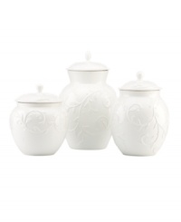 With an elegant white-on-white pattern featuring an embossed vine motif and radiant glaze, the Opal Innocence Carved canisters from Lenox add endless refinement to your kitchen.