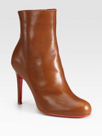 Anything but basic in Italian leather with the signature Louboutin sole.Self-covered heel, 4 (100mm) Shaft, 5 Leg circumference, 9¾ Round toe Hidden side zip Leather lining Padded insole Signature red leather sole Made in ItalyOUR FIT MODEL RECOMMENDS ordering true size.. Anything but basic in Italian leather with the signature Louboutin sole.Self-covered heel, 4 (100mm) Shaft, 5 Leg circumference, 9¾ Round toe Hidden side zip Leather lining Padded insole Signature red leather sole Made in ItalyOUR FIT MODEL RECOMMENDS ordering true size..