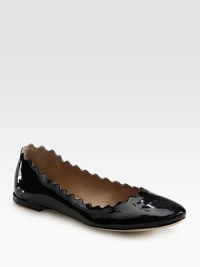 Shiny patent leather flat with a scalloped upper and comfy padded insole. Patent leather upperLeather lining and solePadded insoleMade in ItalyOUR FIT MODEL RECOMMENDS ordering true size. 