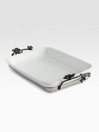 Haute couture for the table, exuding the sensual ambience of black orchids in dark hammered metal and sparkling porcelain. Oven-proof rectangular casserole slips into a stay-cool metal cradle for easy transport from kitchen to table. From the Black Orchid CollectionBlack nickle-plated stainless steel cradlePorcelain casserole: microwave-, dishwasher- and oven-safe; cradle: hand wash9½W X 17¾L X 2¼HImported Haute couture for the table, exuding the sensual ambience of black orchids in dark hammered metal and sparkling porcelain. Oven-proof rectangular casserole slips into a stay-cool metal cradle for easy transport from kitchen to table. From the Black Orchid CollectionBlack nickle-plated stainless steel cradlePorcelain casserole: microwave-, dishwasher- and oven-safe; cradle: hand wash9½W X 17¾L X 2¼HImported