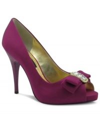 Satin and seductive. The toe of Nina's Elky evening pumps are adorned with a pretty layered bow and topped with sparkling jeweled accents. Satin and seductive. The toe of Nina's Elky evening pumps are adorned with a pretty layered bow and topped with sparkling jeweled accents.