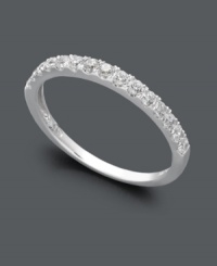 Wear this sparkling ring as a wedding band that pairs nicely with any engagement ring, or create a more modern look as you stack it with other rings on your middle finger. Either way, Arabella's stunning ring will add shine with the addition of a seamless row of round-cut Swarovski zirconias (1 ct. t.w.). Set in 14k white gold. Wear this sparkling ring as a wedding band that pairs nicely with any engagement ring, or create a more modern look as you stack it with other rings on your middle finger. Either way, Arabella's stunning ring will add shine with the addition of a seamless row of round-cut Swarovski zirconias (1 ct. t.w.). Set in 14k white gold.
