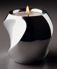 Light up your life with Nambe's twist votive candle holder. Its modern curved shape is rendered in alloy metal. Measures 3 inches tall. Light up your life with Nambe's twist votive candle holder. Its modern curved shape is rendered in alloy metal. Measures 3 inches tall.