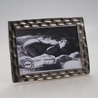 Precious metals and porcelain capture the timeless shifting of ocean, wind and sand into lasting impressions inspired by the dunes of Truro, Cape Cod. Precious metals and porcelain capture the timeless shifting of ocean, wind and sand into lasting impressions inspired by the dunes of Truro, Cape Cod.