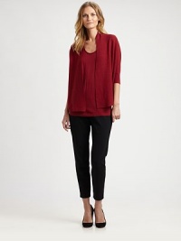 From its luxuriously soft fabrication to its curved hem, everything about this merino wool sweater is feminine. Dolman sleevesCurved hemAbout 25 from shoulder to hemMerino woolDry cleanImported of Italian fabric Model shown is 5'10½ (179cm) wearing US size Small. From its luxuriously soft fabrication to its curved hem, everything about this merino wool sweater is feminine. Dolman sleevesCurved hemAbout 25 from shoulder to hemMerino woolDry cleanImported of Italian fabric Model shown is 5'10½ (179cm) wearing US size Small.