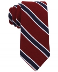 Stripes on this Tommy Hilfiger tie keep any style feeling modern. Stripes on this Tommy Hilfiger tie keep any style feeling modern.