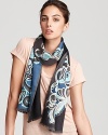 A longer length gives this signature print Emilio Pucci scarf versatility-tie it, wrap it or let it hang.