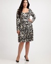 Designed to turn heads, this stretch-modal dress features an alluring scoopneck and an intriguing print. Its long sleeves provide arm coverage as its banded waist will comfortably define your silhouette.ScoopneckLong sleevesPull-on styleAllover printElasticized waistPleated skirtAbout 63 from shoulder to hem92% modal/8% spandexDry cleanMade in USA