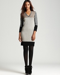 A demure Burberry London color block dress elevates your every day with effortlessly chic style, perfect for all your desk-to-dinner occasions. A demure Burberry London color block dress elevates your every day with effortlessly chic style, perfect for all your desk-to-dinner occasions.
