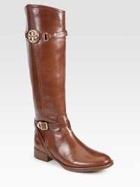 An equestrian-inspired style of polished leather, with the signature medallion and adjustable wrap-around strap. Stacked heel, 1¼ (30mm)Shaft, 17Leg circumference, 13¾Leather upperRubber solePadded insoleImportedOUR FIT MODEL RECOMMENDS ordering one half size up as this style runs small. An equestrian-inspired style of polished leather, with the signature medallion and adjustable wrap-around strap. Stacked heel, 1¼ (30mm)Shaft, 17Leg circumference, 13¾Leather upperRubber solePadded insoleImportedOUR FIT MODEL RECOMMENDS ordering one half size up as this style runs small.