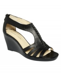 Playful and mischievous. Adrienne Vittadini's Lark wedge sandals feature zipper detail and are a shoe-in for the season. Playful and mischievous. Adrienne Vittadini's Lark wedge sandals feature zipper detail and are a shoe-in for the season.