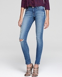 Rock downtown cool in these DL1961 distressed and torn faded jeans and add edge to your weekends. Rock downtown cool in these DL1961 distressed and torn faded jeans and add edge to your weekends.