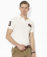 A trim-fitting polo shirt is crafted from breathable cotton mesh with Ralph Lauren's Big Pony at the chest for an iconic finish. A trim-fitting polo shirt is crafted from breathable cotton mesh with Ralph Lauren's Big Pony at the chest for an iconic finish.