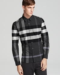 The iconic check print takes center stage in this chic sport shirt from Burberry Brit. The iconic check print takes center stage in this chic sport shirt from Burberry Brit.