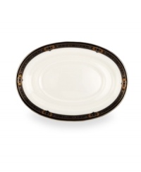 The Vintage Jewel pattern from Lenox's dinnerware and dishes collection evokes a more gracious era, combining white bone china with a dark, richly patterned band accented with subtle touches of cobalt blue. The Vintage Jewel pattern from Lenox's dinnerware and dishes collection evokes a more gracious era, combining white bone china with a dark, richly patterned band accented with subtle touches of cobalt blue.