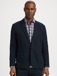 A casual classic in woven cotton with a single button closure and flap welt pockets.Notched lapelButtons on cuffsWelt flap pocketsHalf linedAbout 28½ from shoulder to hemCottonMachine washMade in USA of imported fabric A casual classic in woven cotton with a single button closure and flap welt pockets.Notched lapelButtons on cuffsWelt flap pocketsHalf linedAbout 28½ from shoulder to hemCottonMachine washMade in USA of imported fabric
