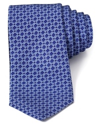 Luxuriously soft silk with an allover chain link pattern is cut in a traditional width for a special addition to your work wardrobe. Luxuriously soft silk with an allover chain link pattern is cut in a traditional width for a special addition to your work wardrobe.