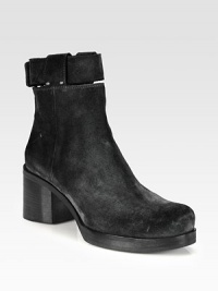 An urban-ready suede ankle boot with a towering stacked heel, exposed metal zipper and detachable ankle strap. Stacked heel, 2 (50mm)Stacked platform, ¾ (20mm)Compares to a 1¼ heel (30mm)Suede upperBack zip and detachable wrap-around strap with metal pull-tab closureLeather lining and solePadded insoleMade in Italy