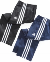 Why fuss with a button or a zip? Get him on track much faster with these striped adidas pull-on pants. Why fuss with a button or a zip? Get him on track much faster with these striped adidas pull-on pants.