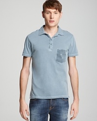Accented with a faded chest pocket and crafted in a slim fit, this cool cotton polo will find its way to the heart of your casual wardrobe. Accented with a faded chest pocket and crafted in a slim fit, this cool cotton polo will find its way to the heart of your casual wardrobe.