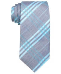An energetic color palette lets this plaid tie from Ben Sherman wake up a charcoal gray world. An energetic color palette lets this plaid tie from Ben Sherman wake up a charcoal gray world.