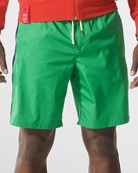 Designed to draw out your inner competitor, this lightweight swim trunk in quick-drying, chlorine-resistant polyester defines smart, athletic style. Designed to draw out your inner competitor, this lightweight swim trunk in quick-drying, chlorine-resistant polyester defines smart, athletic style.