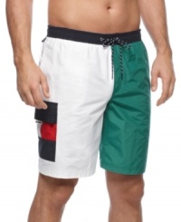 Hit the sand and surf with these all-American swim trunks from Tommy Hilfiger. Hit the sand and surf with these all-American swim trunks from Tommy Hilfiger.