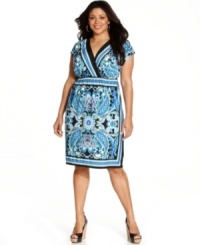 Liven up your look for the season with AGB's short sleeve plus size dress, highlighted by a scarf print. Liven up your look for the season with AGB's short sleeve plus size dress, highlighted by a scarf print.