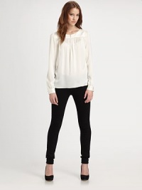 Easy styling in its truest form, this delicate silk top has buttoned cuffs and strategically placed shirring. BoatneckButton closuresLong sleeves with buttoned cuffsSilkDry cleanImportedModel shown is 5'10 (177cm) wearing US size Small. Easy styling in its truest form, this delicate silk top has buttoned cuffs and strategically placed shirring. BoatneckButton closuresLong sleeves with buttoned cuffsSilkDry cleanImportedModel shown is 5'10 (177cm) wearing US size Small.