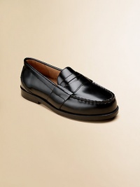 A classic leather slip-on with penny slot creates a retro, handsome look. Slip-on Leather upper Leather sole Padded insole Leather lining Imported A classic leather slip-on with penny slot creates a retro, handsome look. Slip-on Leather upper Leather sole Padded insole Leather lining Imported