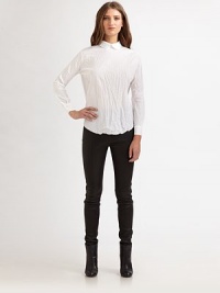 Sweet yet sultry, this classic style soft blouse is given an extra dose of glamor with an elongated keyhole across the back. Peter Pan Collar with back button closureLong sleeves with button cuffsExposed keyhole at backFrayed trim along the hemAbout 24 from shoulder to hemCottonDry cleanImportedModel shown is 5'11 (180cm) wearing US size 4. Sweet yet sultry, this classic style soft blouse is given an extra dose of glamor with an elongated keyhole across the back. Peter Pan Collar with back button closureLong sleeves with button cuffsExposed keyhole at backFrayed trim along the hemAbout 24 from shoulder to hemCottonDry cleanImportedModel shown is 5'11 (180cm) wearing US size 4.