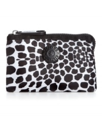 This decidedly posh pouch by Kipling slips discretely into your handbag and safely stores passport, money, keys and a few beauty essentials with ease. This decidedly posh pouch by Kipling slips discretely into your handbag and safely stores passport, money, keys and a few beauty essentials with ease.