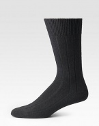 A dressed-up look with generous cashmere softness and plenty of stay-put stretch. Mid-calf height Wool/viscose/cashmere/polyamide; machine wash Imported