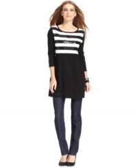 Sequined stripes at the chest give this sweater shimmer for the season! This Style&co. tunic looks fab over skinny jeans or leggings. Sequined stripes at the chest give this sweater shimmer for the season! This Style&co. tunic looks fab over skinny jeans or leggings.