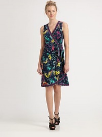 An eye-catching print revitalizes the classic wrap-dress in a light, sleeveless silhouette.V necklineSleevelessWrap-front ties at sideContrast trimAbout 37 from shoulder to hem94% polyester/6% spandexDry cleanImportedModel shown is 5'11 (180cm) wearing US size Small. An eye-catching print revitalizes the classic wrap-dress in a light, sleeveless silhouette.V necklineSleevelessWrap-front ties at sideContrast trimAbout 37 from shoulder to hem94% polyester/6% spandexDry cleanImportedModel shown is 5'11 (180cm) wearing US size Small.